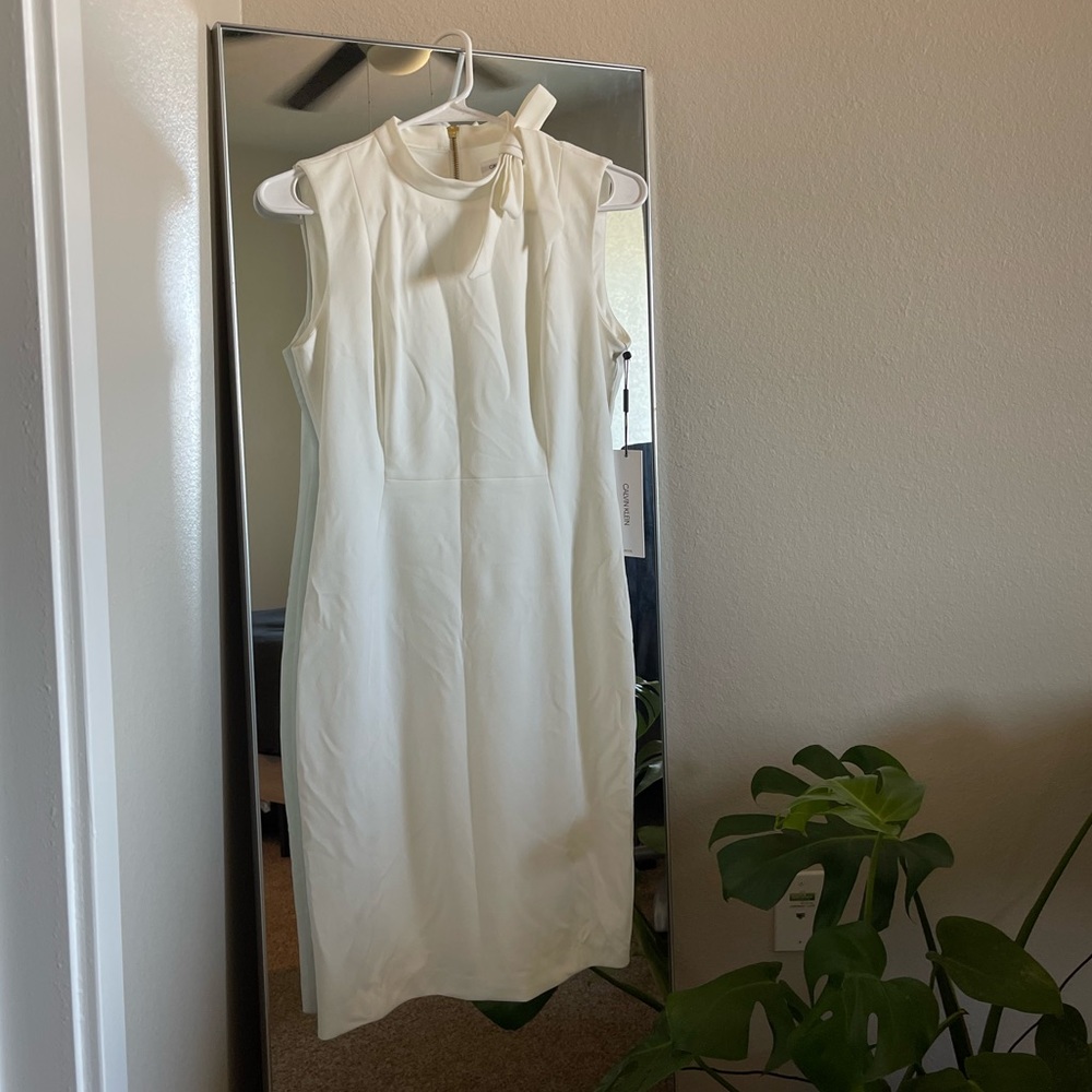 White calven Klein business dress